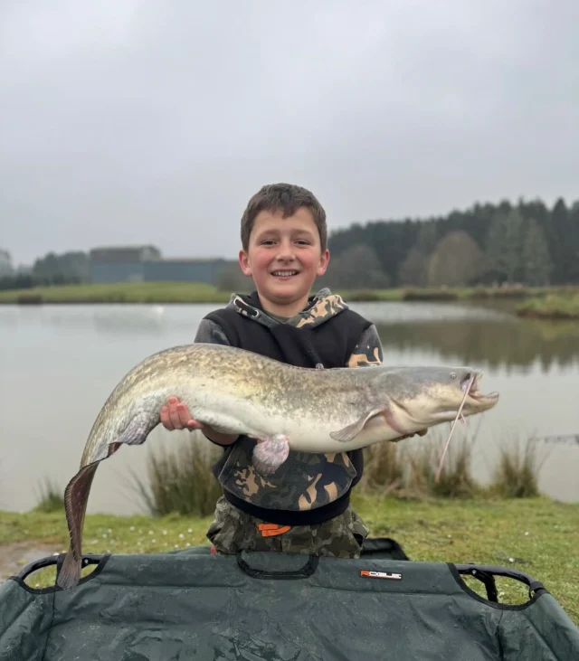 Eli with his first ever catfish at our Syndicate water Rosie’s retreat ! Great angling 👏🥳 memories that will last for life ❤️ #rosiesretreat #ls #kidsfishing #fishing #kidsfishing #makesitallworthwhile #rr